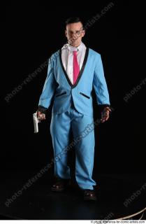 MIKAEL SPY STANDING POSE WITH GUN